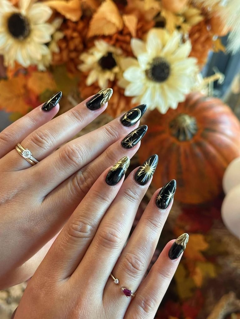 Black-and-Gold Celestial Nails