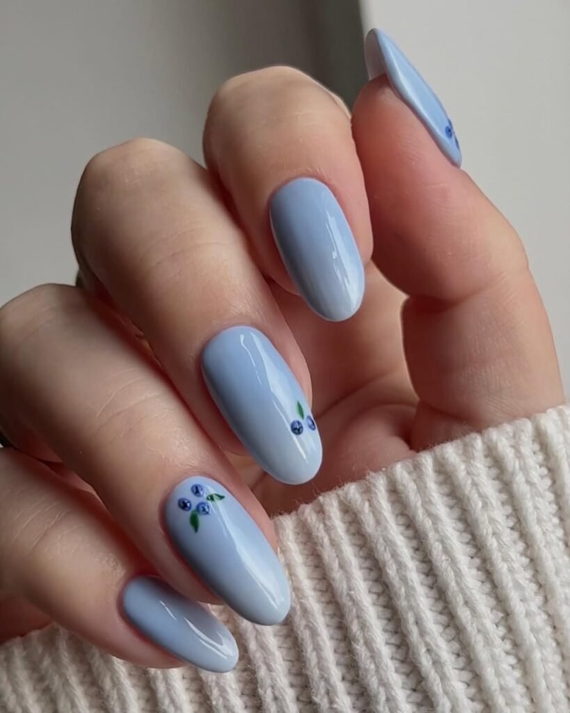 Glossy Blue Milk Almond Nails