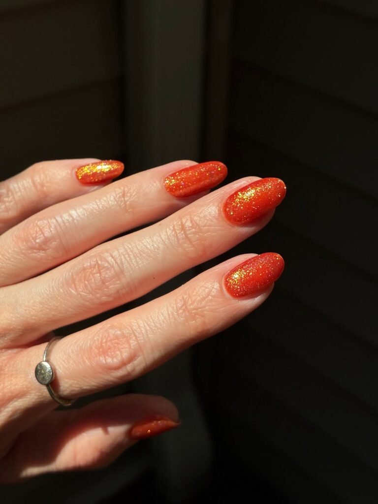 Orange Glitter Nails