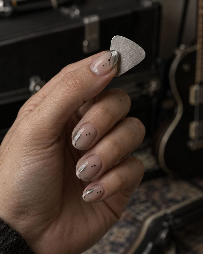 Silver Guitar-Pick Negative-Space Nails